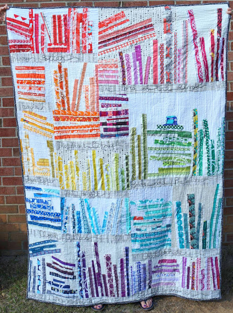http://www.quiltyhabit.com/2015/09/selvage-rainbow-bookcase-quilt.html